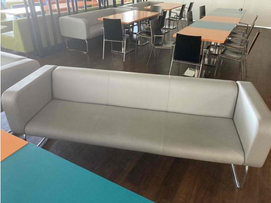 Grey sofa with armrests
