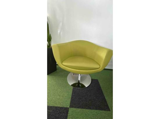 Green armchair on silver leg