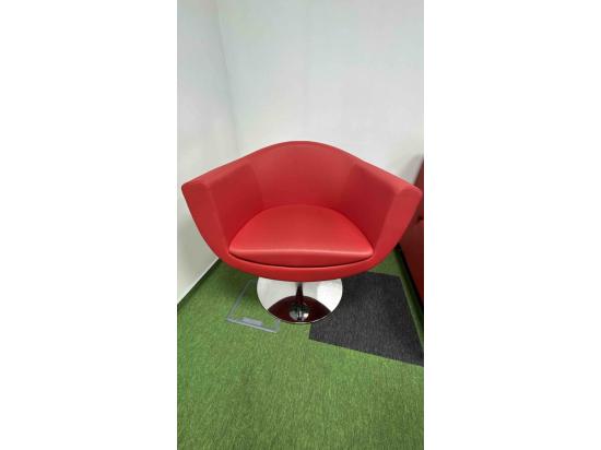 Red armchair on silver leg