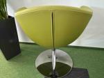 Green armchair on silver leg