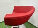 Red armchair on silver leg