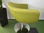 Green armchair on silver leg
