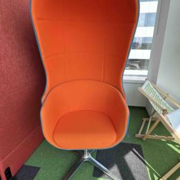 Large orange armchair