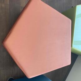 Orange sofa without backrest 90