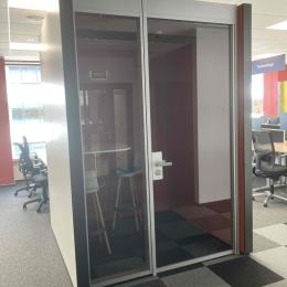 Small glazed acoustic booth