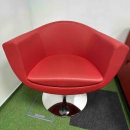 Red armchair on silver leg